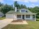 Charming single-story home with a well-maintained front yard and attached garage at 3384 Brookside Ln, Jonesboro, GA 30236