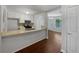 Functional kitchen with stainless steel appliances and a breakfast bar at 3384 Brookside Ln, Jonesboro, GA 30236
