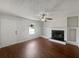 Bright living room with hardwood floors and a fireplace, perfect for gatherings at 3384 Brookside Ln, Jonesboro, GA 30236