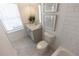 Bathroom featuring neutral color palette, vanity with sink, toilet, and tub at 630 Skytop Dr # 157, Cumming, GA 30040