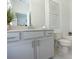 Bright bathroom with tile flooring, vanity, toilet and modern decor at 630 Skytop Dr # 157, Cumming, GA 30040