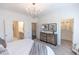 Bedroom boasts soft carpeting, neutral color scheme, and an ensuite bathroom and closet at 630 Skytop Dr # 157, Cumming, GA 30040