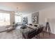 Cozy living room featuring modern decor, a stylish chandelier, and a comfortable seating area at 630 Skytop Dr # 157, Cumming, GA 30040