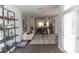 Open-concept living space with stylish decor, modern furnishings, and plenty of natural light at 630 Skytop Dr # 157, Cumming, GA 30040
