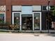 EcoDenizen gifts storefront featuring large windows and a modern awning with gifts inside and plants on the sidewalk at 630 Skytop Dr # 157, Cumming, GA 30040
