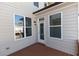 Back deck access with exterior door and two windows at 631 Silva St # 129, Cumming, GA 30040