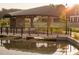 Covered gazebo with water views; community space at 631 Silva St # 129, Cumming, GA 30040