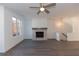 Bright living room featuring a fireplace and hardwood floors at 631 Silva St # 129, Cumming, GA 30040