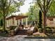 Pergola and brick stairs in a landscaped courtyard at 631 Silva St # 129, Cumming, GA 30040