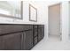 Bathroom featuring gray vanity with double sinks and walk-in shower at 362 Olmstead Way # 23, Alpharetta, GA 30002