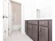 Bright bathroom featuring gray vanity, tile floors and shower-tub combination at 362 Olmstead Way # 23, Alpharetta, GA 30002