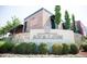 Exterior view of Avalon with landscaped entrance, brick building, and signage for Rockado Burger at 362 Olmstead Way # 23, Alpharetta, GA 30002