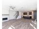 Open-concept living room with fireplace seamlessly connects to the kitchen at 362 Olmstead Way # 23, Alpharetta, GA 30002