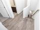 Hallway with staircase and entry to a bathroom at 362 Olmstead Way # 23, Alpharetta, GA 30002