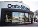 Exterior of Crate and Barrel store featuring large display windows and a modern, curved facade at 362 Olmstead Way # 23, Alpharetta, GA 30002