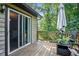 Wooden deck with patio furniture and umbrella at 2641 Short Trl, Lithia Springs, GA 30122