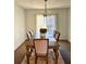 Dining room with a large wooden table and six chairs at 2641 Short Trl, Lithia Springs, GA 30122