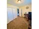 Home office features carpet, built in closet and a desk at 2641 Short Trl, Lithia Springs, GA 30122