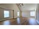 Bright and airy bedroom with hardwood floors, high ceilings, and large windows would be great as a guest bedroom at 932 Nestling Dr, Lawrenceville, GA 30045