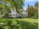 Large white two-story house with wrap-around porch at 5809 Warren Farm Sw Rd, Powder Springs, GA 30127