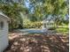 Landscaped backyard with pool, gazebo, and spacious yard at 5809 Warren Farm Sw Rd, Powder Springs, GA 30127