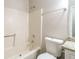 Clean bathroom with tub, toilet, and granite vanity top at 2920 Cushing Ct, Jonesboro, GA 30236
