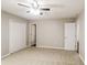 Large bedroom featuring ceiling fan and ample closet space at 2920 Cushing Ct, Jonesboro, GA 30236