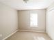 Simple bedroom with neutral walls and carpet at 2920 Cushing Ct, Jonesboro, GA 30236
