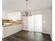 Bright dining room with hardwood floors and sliding glass door at 2920 Cushing Ct, Jonesboro, GA 30236