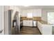 Modern kitchen featuring stainless steel appliances and granite countertops at 2920 Cushing Ct, Jonesboro, GA 30236