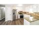 Updated kitchen with granite countertops and stainless steel appliances at 2920 Cushing Ct, Jonesboro, GA 30236