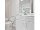 Clean bathroom with white vanity, toilet and bathtub at 2506 Astaire Ct, Atlanta, GA 30318