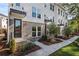 Modern townhome exterior with brick accents and landscaped walkway at 2506 Astaire Ct, Atlanta, GA 30318