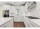 Modern kitchen with white cabinets and stainless steel appliances at 2506 Astaire Ct, Atlanta, GA 30318