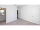 Well-lit bedroom featuring plush gray carpeting with a bath and closet at 352 Olmstead Way # 28, Alpharetta, GA 30022