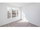 Well-lit bedroom with large window offering a lovely view, perfect for relaxing at 352 Olmstead Way # 28, Alpharetta, GA 30022