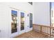Cozy outdoor deck with a sliding glass door, offering a perfect transition between indoor and outdoor living at 352 Olmstead Way # 28, Alpharetta, GA 30022