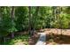 A winding path through the community, offering a peaceful route surrounded by lush trees at 352 Olmstead Way # 28, Alpharetta, GA 30022