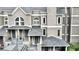 Charming townhome with a modern gray exterior, inviting entrance, and well-maintained landscaping at 14 Saint Claire Ne Ln, Atlanta, GA 30324