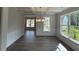 Bright dining room with elegant trim, hardwood floors, and modern chandelier, perfect for Gathering meals at 1065 Low Water Nw Xing, Acworth, GA 30101