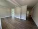 Bright living room featuring hardwood floors, recessed lighting, and neutral paint, creating a welcoming atmosphere at 1065 Low Water Nw Xing, Acworth, GA 30101
