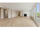 Open living room featuring recessed lighting, built-in shelving and a cozy fireplace at 5365 Maggie Mae Ln, Cumming, GA 30028