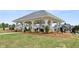Spacious outdoor pavilion with seating, landscaping, and views of the community at 5365 Maggie Mae Ln, Cumming, GA 30028