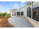 Spacious stone patio with exterior access, perfect for outdoor dining and entertainment at 5365 Maggie Mae Ln, Cumming, GA 30028