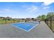 Community pickleball court surrounded by green space and other amenities at 5365 Maggie Mae Ln, Cumming, GA 30028
