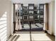Balcony overlooking the neighborhood with modern buildings and parking at 371 Pratt Se Dr # 203, Atlanta, GA 30315