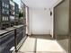 Balcony overlooking the back with modern buildings and garages at 371 Pratt Se Dr # 203, Atlanta, GA 30315
