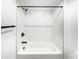 Modern bathroom features a sleek tub with matte black fixtures and white subway tile at 371 Pratt Se Dr # 203, Atlanta, GA 30315