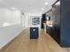 Open kitchen with stainless steel appliances, a large island, and modern cabinetry at 371 Pratt Se Dr # 203, Atlanta, GA 30315