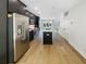 Open kitchen with stainless steel appliances, a large island, and modern cabinetry at 371 Pratt Se Dr # 203, Atlanta, GA 30315